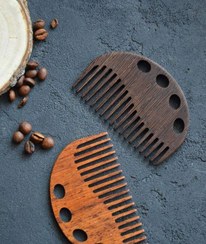 تصویر شانه چوبی خالدار Spotted wooden comb