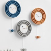 تصویر ساعت دیواری فانتزی پاندول دار مدل رولت 