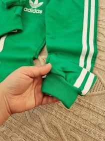 تصویر سه تیکه ورزشی سویشرت شلوار و تیشرت دخترانه و پسرانه آدیداس Three sports pieces, sweatshirts, pants and t-shirts for girls and boys from Adidas