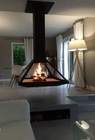 تصویر شومینه معلق چند ضلعی تمام شیشه Hanging polygonal fireplace