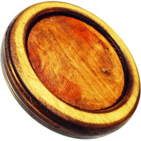 تصویر زیر لیوانی چوبی گرد 