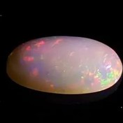 تصویر اپال استرالیایی آتشین پرتلالو درشت طبیعی و معدنی 