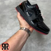 تصویر کتونی زنانه نایک ایر جردن 1 لو مشکی قرمز 