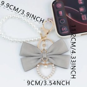 تصویر جاکلیدی پاپیونی قلبی مرواریدی 