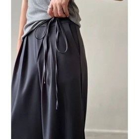 تصویر شلوار زنانه برنس مدل بهاره گشاد پارچه ای جیب دار رنگ سرمه ای 