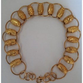تصویر دستبند بدل طلایی لوله ای 