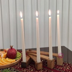 تصویر جا شمعی چوبی رو میزی کوچک با جای ۴ شمع 