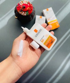 تصویر فلوئید ضد آفتاب لاروش پوزای بی رنگ 50 میل غیراصل La Roche-Posay invisible Sunscreen fluid SPF50 50ml