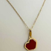 تصویر آویز طلا قلب سنگ قرمز | نماد عشق پرقدرت، انرژی و احساس عمیق 