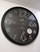 تصویر ساعت دیواری جدید وست تایم(سیتیزن)عمده وتک - مشکی اعداد نقره ای 