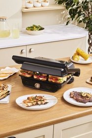 تصویر دستگاه ساندویچ و تست چند رنگ گریل Gastro Grill Glass 2400W Tast And Grilling Machine Walnut Brown 6 برش ظرفیت Karaca 