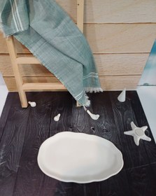 تصویر سینی لبه دفرمه بیضی 