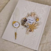 تصویر دفتر بله برون و ملزومات 