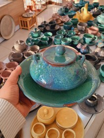 تصویر قندان در دار سرامیکی - صورتی رگه دار 