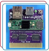 تصویر TeensyROM is a ROM emulator, super fast loader, MIDI Host+Device and Internet interface cartridge for the Commodore 64 & 128, based on the Teensy 4.1 