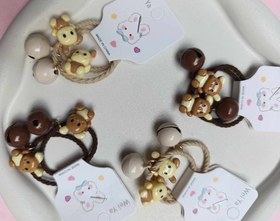 تصویر کش مو زنگوله دار 