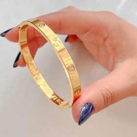 تصویر دستبند کارتیر طلایی 