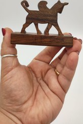 تصویر مجسمه چوبی هخامنشی 