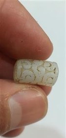 تصویر مهره یشم با نقش قدیمی 