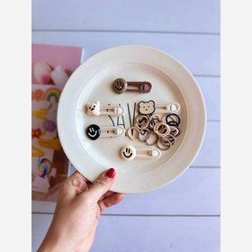 تصویر پک انبری و کش مو 