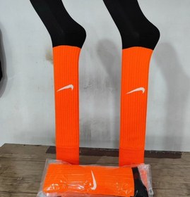 تصویر جوراب فوتبال ساق بلند طرح نایک رنگ نارنجی 