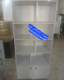 تصویر کمد طبقه ای آرایشگاهی دررنگ بندی سفیدومشکی 