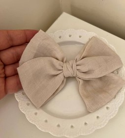 تصویر گلسر پاپیون وال کرم 