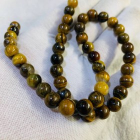 تصویر ریسه چشم گربه قهوه‌اى 