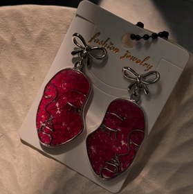 تصویر گوشواره صورتک گل‌دار 