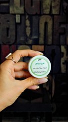 تصویر کرم روشن کننده و ضدلک تابان 