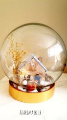 تصویر جعبه موزیکال کلبه چوبی زمستانی با دختر و پسر 