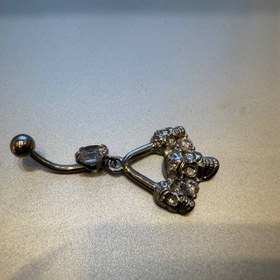 تصویر پرسینگ ناف طرح اسکلت 