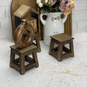 تصویر چهارپایه چوبی 