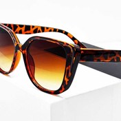 تصویر عینک آفتابی زنانه 2025 | طرح پلنگی ترند با لنز UV400 