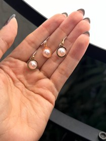 تصویر اویز مروارید صورتی 