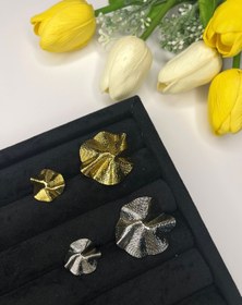 تصویر دکمه فلزی دفرمه ایتالیایی 