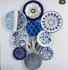 تصویر ست دیوار کوب طرح گل آبی برجسته با ورق نقره 