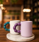 تصویر ماگ سرامیکی شیار دار با دسته مرواریدی 