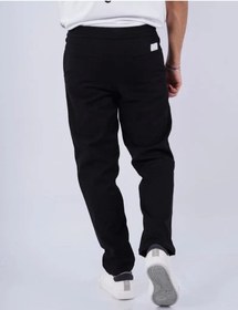 تصویر شلوار مردانه با کمر کشی و بند دار در طول بلند به رنگ مشکی خالص برند jack & jones Men’s Drawstring Elastic Waist Band Long Length Pant in Pure Black