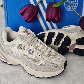 تصویر کفش کتونی زنانه آدیداس رنگ کرم با خطوط بنفش Adidas 602 C 