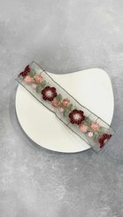 تصویر هدبند توری طرح گلستان 