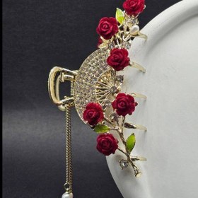 تصویر کلیپس مو فلزی گل قرمز 