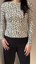 تصویر بلوز زنانه یقه گرد ساده پلنگی 