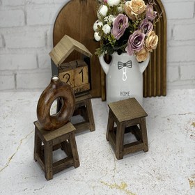 تصویر چهارپایه چوبی 