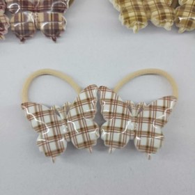 تصویر کش موی بچگانه 