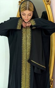 تصویر مانتو جلو بسته وارداتی اماراتی، کار شده با سنگ اتریشی طلایی ، بدون ریزش، جنس پارچه ندا، همراه شال سایز ۳۸ تا ۴۸ ا Abaya Abaya