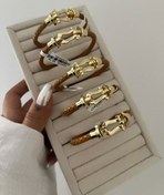 تصویر دستبند چرمی امگا قهوه‌ای 