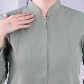 تصویر مانتو شلوار دکمه فلزی سبز پسته ای 