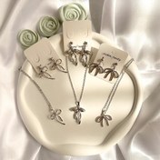 تصویر گردنبند و گوشواره پاپیون 