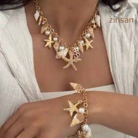 تصویر گردنبند و دستبند پر آویز 